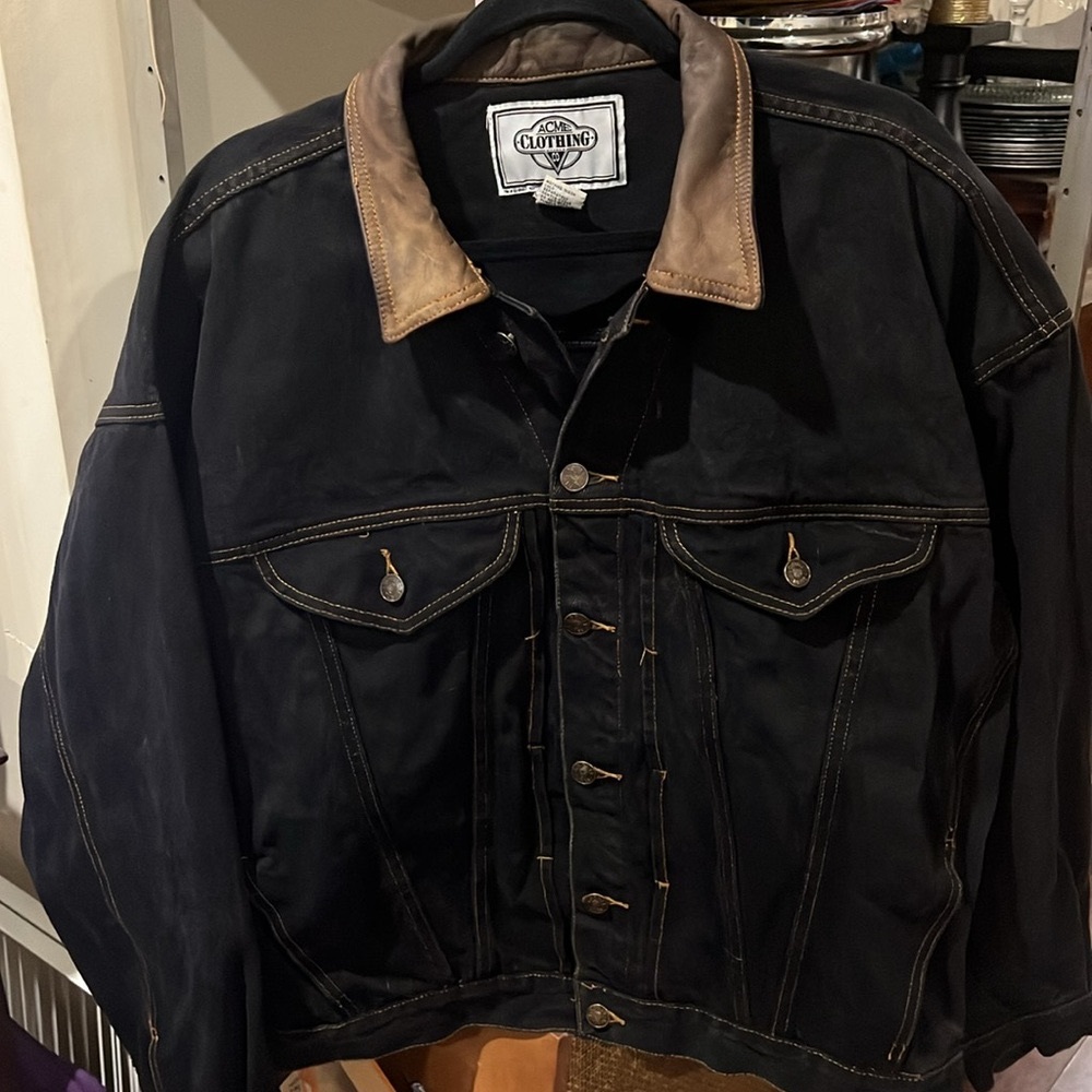 Vintage 1993 denim jacket with leather collar. Tasmanian devil on back. Rare!!